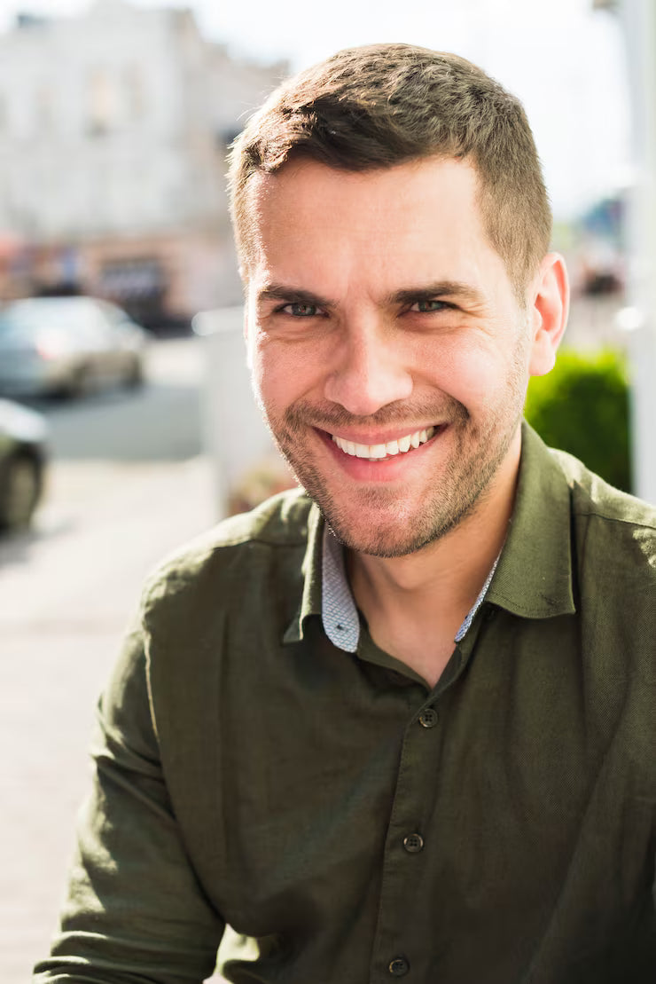 files/portrait-smiling-young-man-looking-camera_23-2148193854.avif